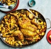 Yotam Ottolenghi’s recipes for roast chicken with butter beans, and potatoes with peppers and garlic